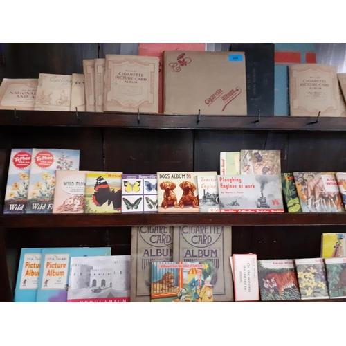 200 - A large quantity of early 20th century cigarette cards and 1970's tea collectors cards together with... 