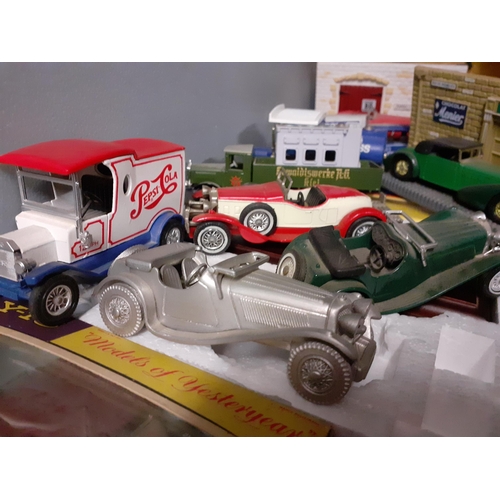 208 - Late 20th century diecast collectors vehicles, some boxed, to include a Britain's Forest Harvester, ... 