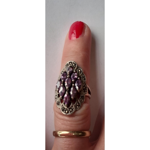 80 - Five Modernist silver and silver tone fashion rings with coloured cabochons, total weight 79.2g. Loc... 