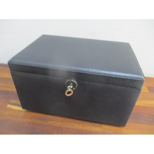 204 - A modern jewellery box having a hinged lid with inset mirror and three drawers
Location: BWR