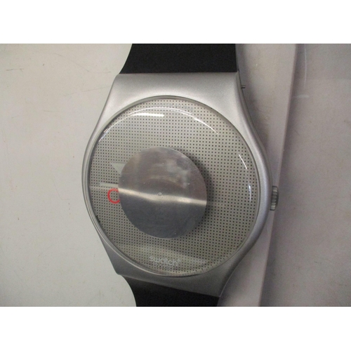 224 - A large Swatch wall hanging clock 209cm h x 30cm w
Location: STAIRS