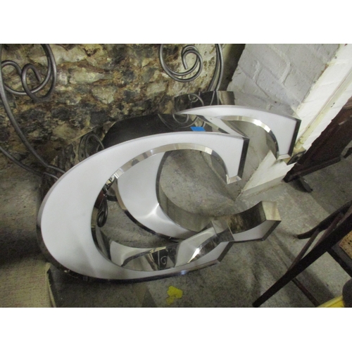 231 - A modern contemporary silver coloured hall stand, together with a matching wall mirror, two candlest... 