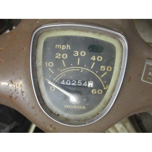 239 - A Honda C90 motorcycle, beaver brown colour, one owner from new, first registered 14/08/1975, in nee... 