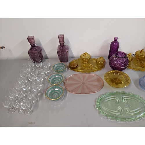 82 - Glassware to include a red dimpled lamp dressing table sets, a pair of purple decanters, pedestal gl... 