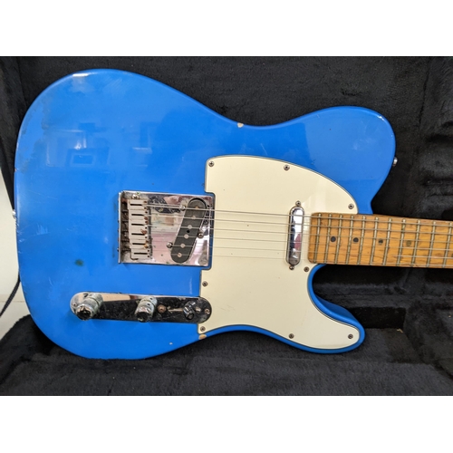 100 - A 1990s Fender Telecaster Lake Placid blue metallic guitar made in USA serial number 503177
Location... 
