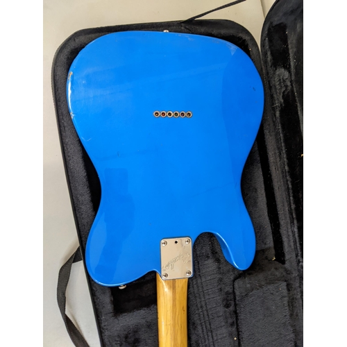 100 - A 1990s Fender Telecaster Lake Placid blue metallic guitar made in USA serial number 503177
Location... 