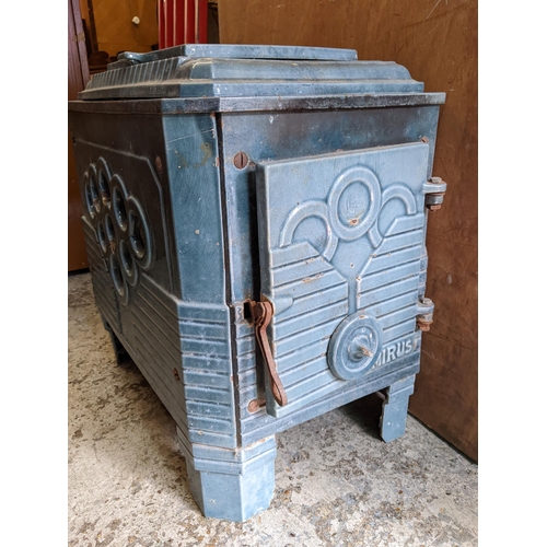 184 - An early 20th century French enamelled wood burning stove in blue with side access
Location: G