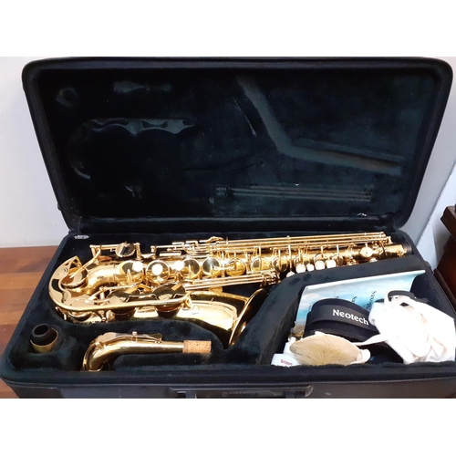 A Yamaha brass alto saxophone, serial number YAS-275 JF1479, with