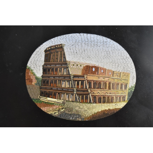 125 - A 19th century Italian Roman micromosaic Grand Tour paperweight, of serpentine form with central ova... 