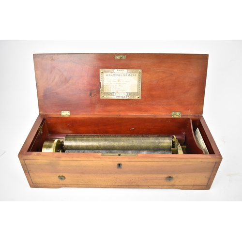 134 - A 19th century Nicole Freres musical box with string inlay, the cylinder playing on six airs with or... 