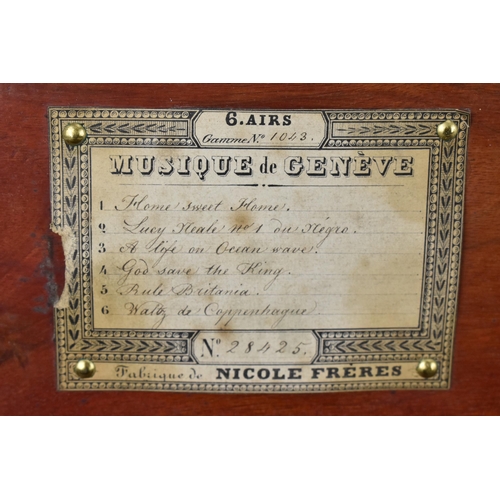 134 - A 19th century Nicole Freres musical box with string inlay, the cylinder playing on six airs with or... 