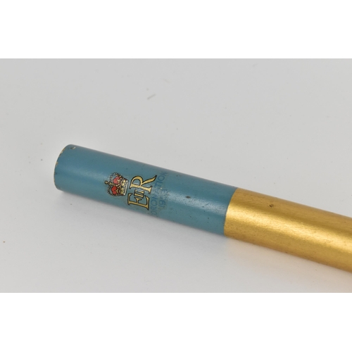 135 - An Elizabeth II staff officer's baton, gold and light-blue painted and relating to the 1953 Coronati... 