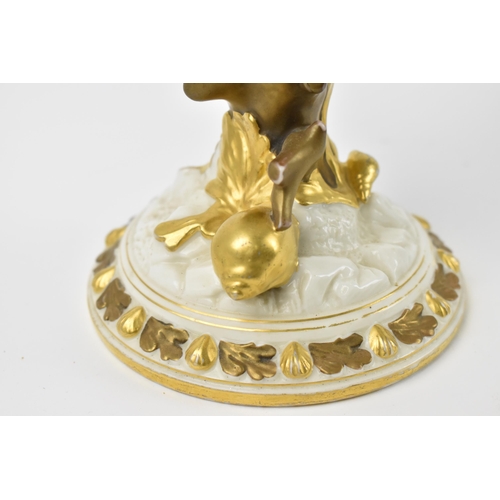 136 - A late 19th century Royal Worcester nautilus spoon warmer of ivory ground with gilt border, on a nat... 