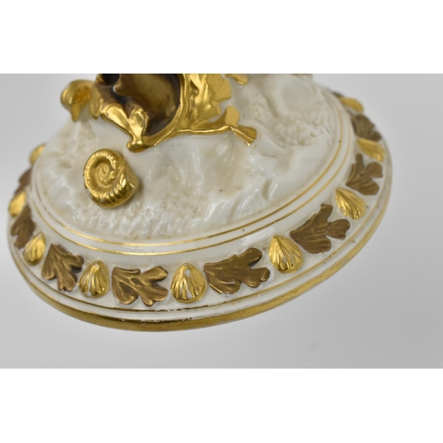 136 - A late 19th century Royal Worcester nautilus spoon warmer of ivory ground with gilt border, on a nat... 