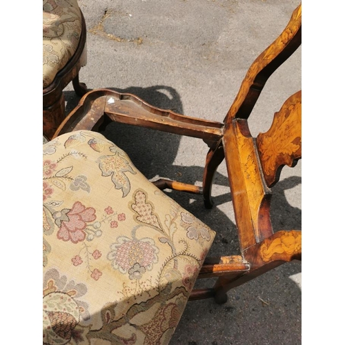 141 - A pair of 18th century Dutch walnut and marquetry high back dining chairs, the inlaid splat depictin... 