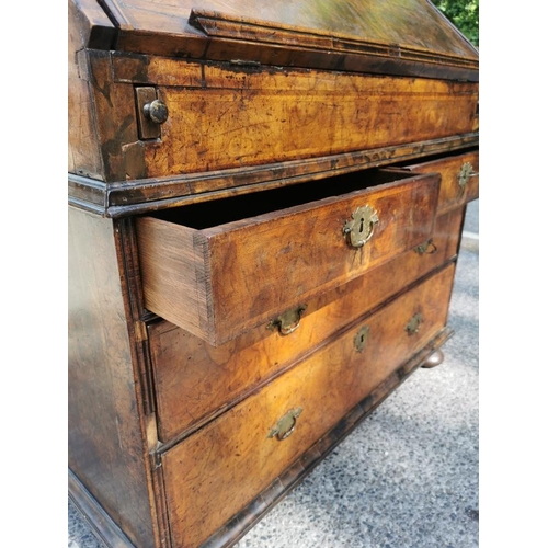 142 - An early 18th century burr walnut bureau cabinet, circa 1720, in the manner of Coxed and Woster, the... 