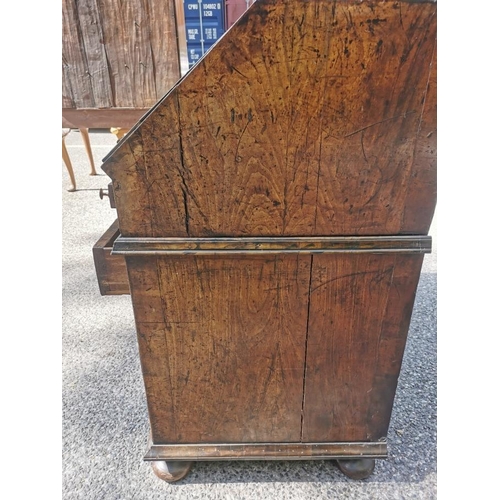 142 - An early 18th century burr walnut bureau cabinet, circa 1720, in the manner of Coxed and Woster, the... 