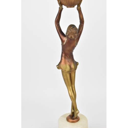 102 - An Art Deco style lamp after 'Ball girl' by Joseph Lorenzel, modelled as a dancer holding the light ... 