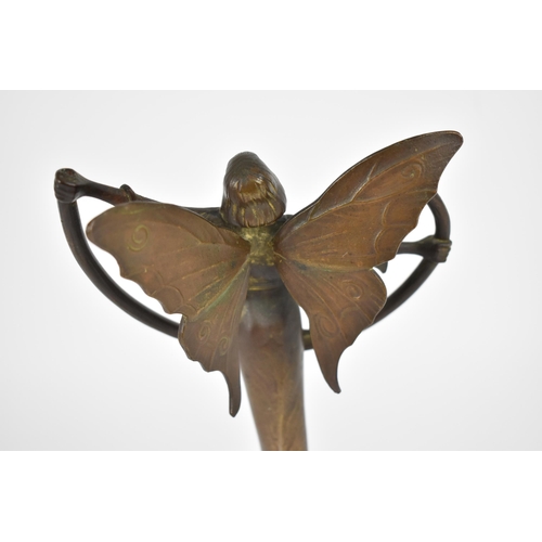 103 - An Arts and Crafts copper plaque by William Thomas Pavitt (1870-1937), modelled as a winged angel, w... 