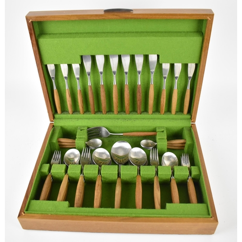 116 - A Norwegian canteen of cutlery by Helle for six settings, mounted with wooden handles, in a fitted c... 