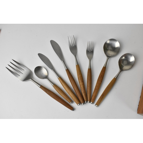 116 - A Norwegian canteen of cutlery by Helle for six settings, mounted with wooden handles, in a fitted c... 