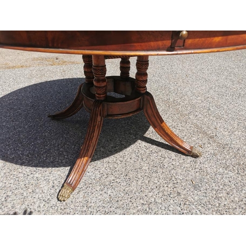 140 - A Regency style flame mahogany and satinwood veneer 'jupe' extending dining table, starting as a cir... 