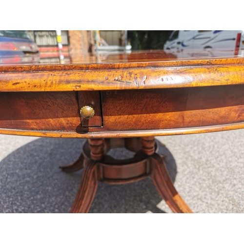 140 - A Regency style flame mahogany and satinwood veneer 'jupe' extending dining table, starting as a cir... 