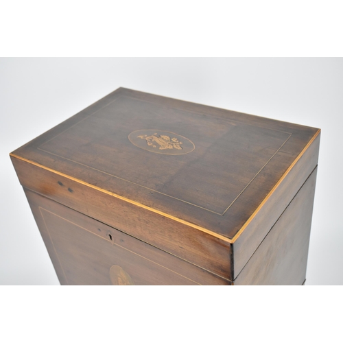 144 - A George III mahogany cellarette, circa 1790, of rectangular form with inlay and box stringing, the ... 