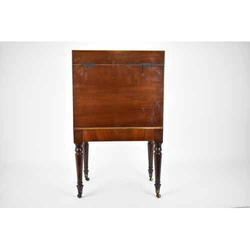 144 - A George III mahogany cellarette, circa 1790, of rectangular form with inlay and box stringing, the ... 