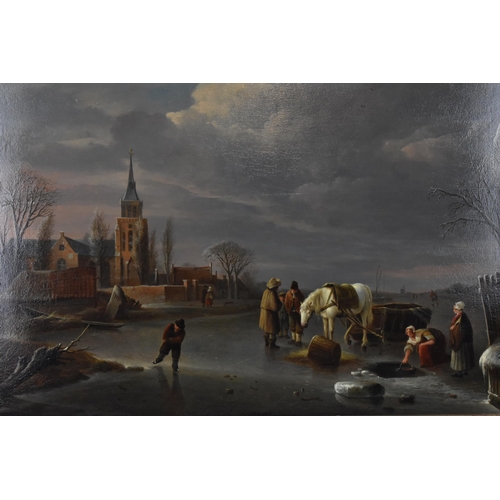 145 - Andries Vermeulen (1765-1914) Dutch, winter scene depicting a frozen lake by a village church with f... 