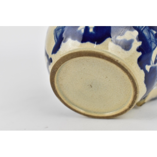 170 - A 19th century blue and white pearlware jug, in the Chinese taste, the rim with floral frieze above ... 