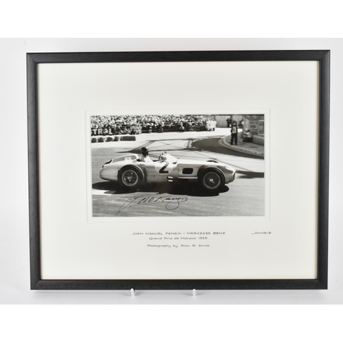 201 - A signed reprinted photograph of Juan Manuel Fangio, racing a Mercedes Benz, Grand Prix de Monaco 19... 