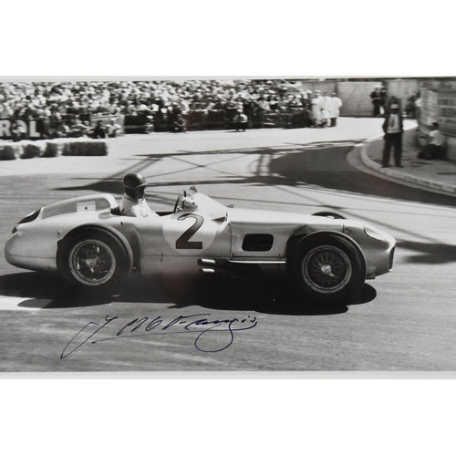 201 - A signed reprinted photograph of Juan Manuel Fangio, racing a Mercedes Benz, Grand Prix de Monaco 19... 