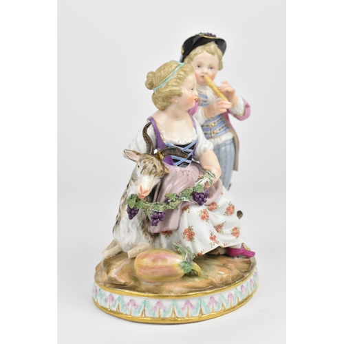 227 - A 19th century Meissen figural group modelled as the allegory of Autumn, the boy playing the pipe, t... 