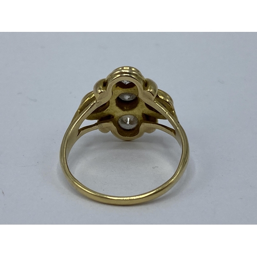 238 - A yellow metal diamond and sapphire ring having three round brilliant cut diamonds approx 4.8mm dia ... 