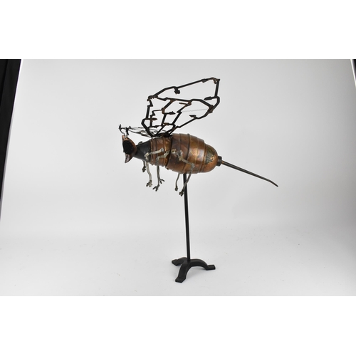 112 - Matt Cobb, Riveting Welds - a sculpture of a bee in recycled coper and other metals, comprising of a... 