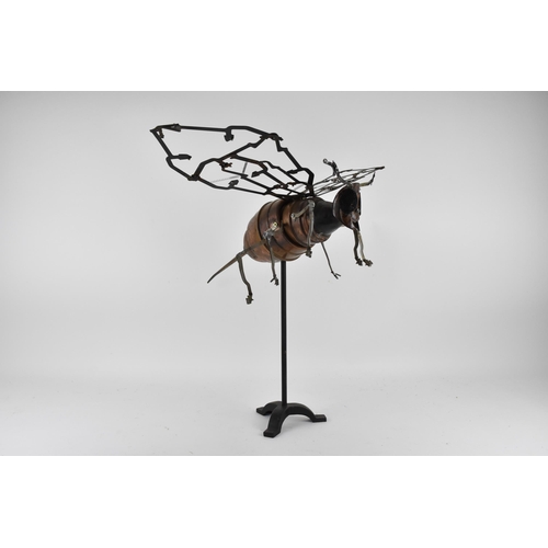 112 - Matt Cobb, Riveting Welds - a sculpture of a bee in recycled coper and other metals, comprising of a... 