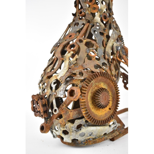 113 - Matt Cobb, Riveting Welds - a sculpture of a rabbit in recycled metal objects to include spanners, c... 