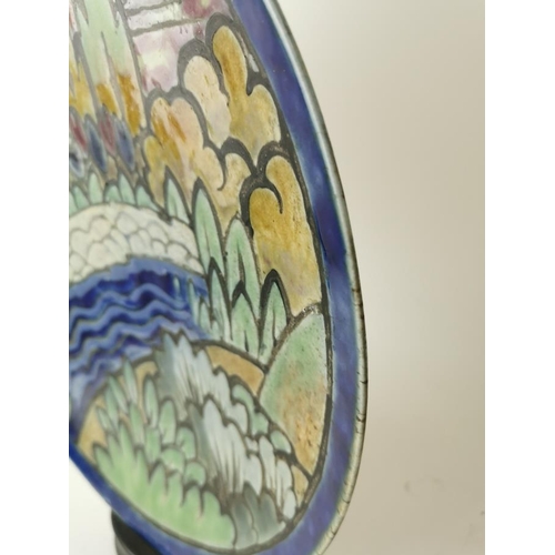 191 - A 1920s/1930s Doulton Lambeth glazed stoneware charger painted by Vera Huggins and assistant Florrie... 