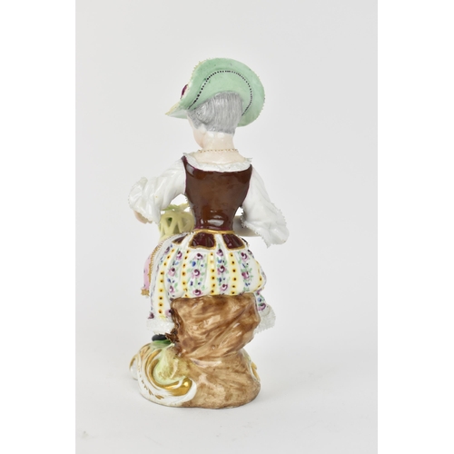 226 - A 19th century Meissen figure modelled as a girl sat on a rock holding a basket of flowers, on a sha... 