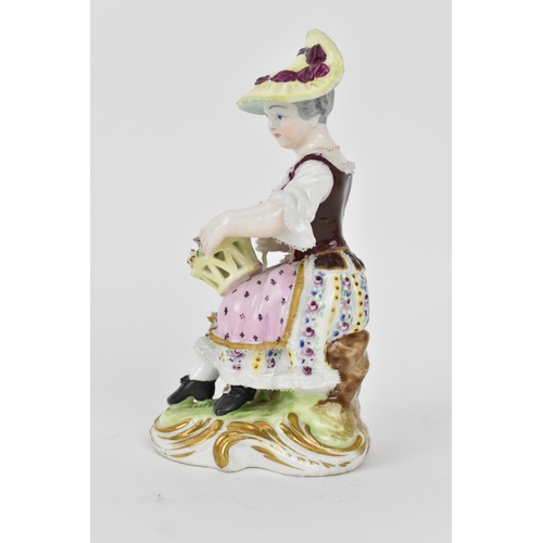 226 - A 19th century Meissen figure modelled as a girl sat on a rock holding a basket of flowers, on a sha... 