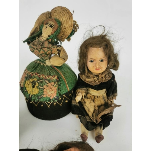 232 - Four early 20th century small dolls to include a porcelain headed example, stamped France 60 71 140,... 