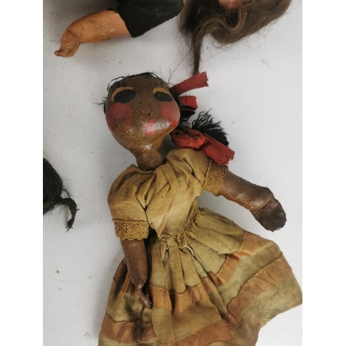 232 - Four early 20th century small dolls to include a porcelain headed example, stamped France 60 71 140,... 