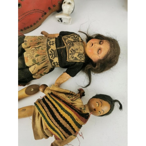 232 - Four early 20th century small dolls to include a porcelain headed example, stamped France 60 71 140,... 