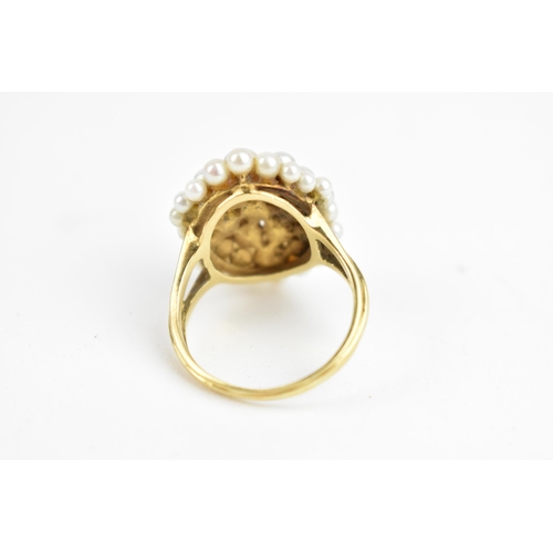 235 - An 18ct yellow gold ring set with numerous graduating pearls, (one deficient), stamped PG LD, size Q... 