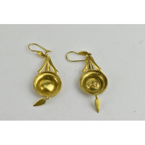 237 - A pair of gold coloured earrings, each set with four seed pearls, set in a concave disc, engraved su... 