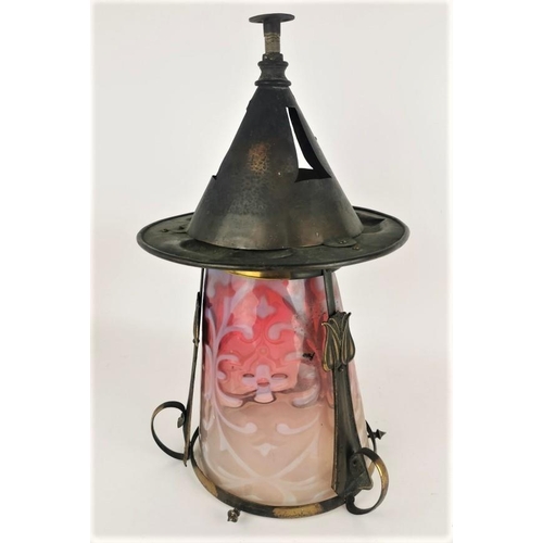 65 - An Arts and Crafts period lantern, in the style of  the hammered copper and brass fitting with funne... 