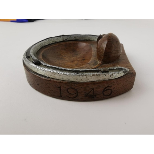 76 - Robert 'Mouseman' Thompson of Kilburn (1876-1955), a carved oak and steel horseshoe pin tray, with s... 