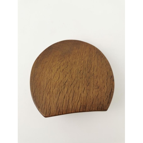 76 - Robert 'Mouseman' Thompson of Kilburn (1876-1955), a carved oak and steel horseshoe pin tray, with s... 