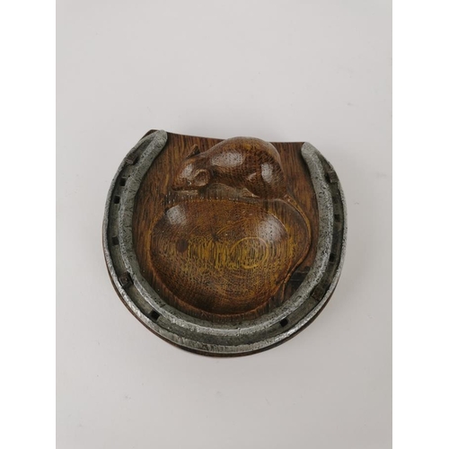 77 - Robert 'Mouseman' Thompson of Kilburn (1876-1955), a carved oak and steel horseshoe pin tray, with s... 